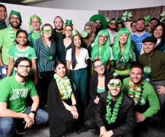 Canada drives team members dress festively in green for St. Patrick's day.