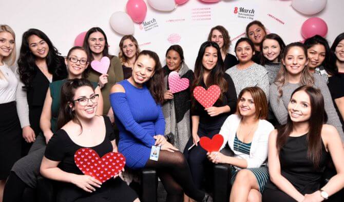 Canada drives team celebrate international women's day with balloons and heart-shaped designs.